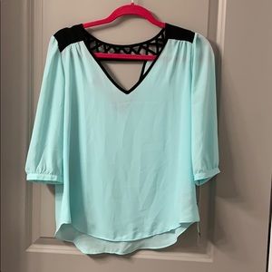Mint colored cropped sleeve top